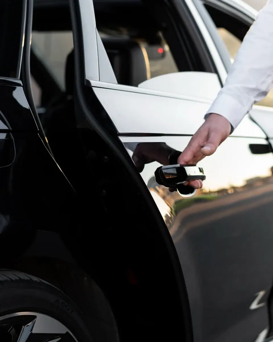 Chauffeur providing airport transfer service in Bangkok.