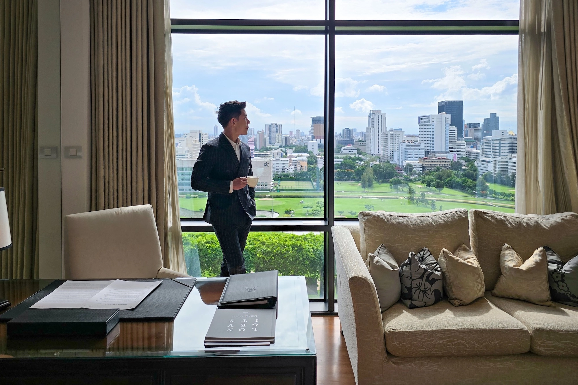 business man drinking coffee 5 star hotel bangkok